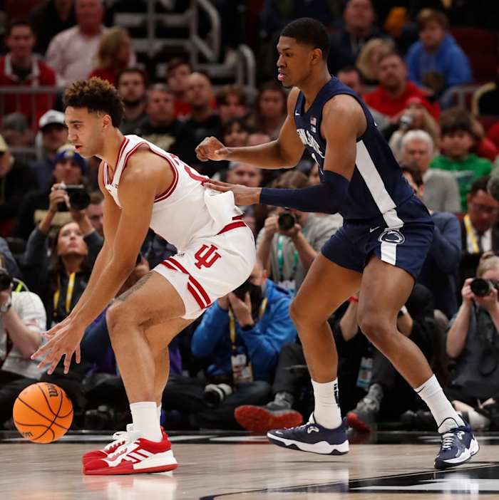 Trayce Jackson-Davis (23) is defended by Penn State Nittany Lions forward Kebba Njie (3) during the Big Ten Men s Basketball Tournament semifinal game.